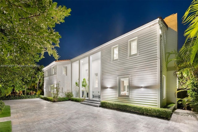 view of front of property featuring a patio