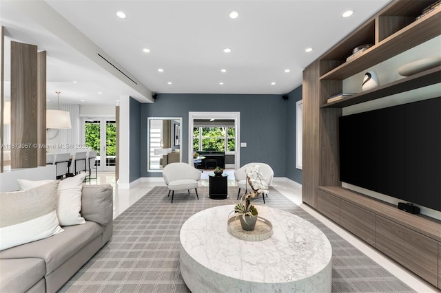 living room with plenty of natural light