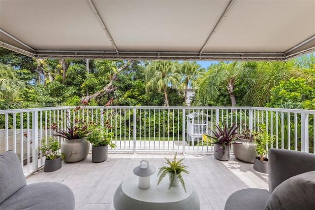 view of patio featuring a balcony