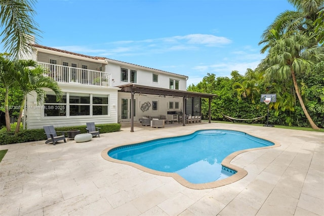 view of swimming pool featuring a grill, a pergola, an outdoor hangout area, and a patio area