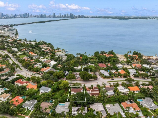 drone / aerial view with a water view