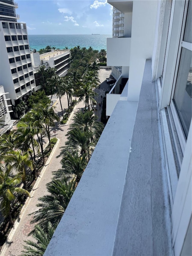 balcony featuring a water view