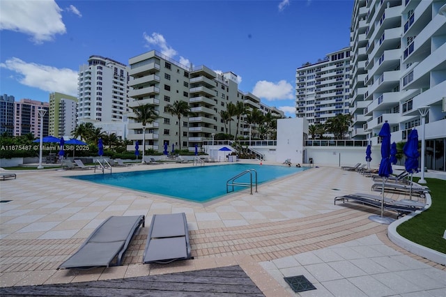 pool with a patio area