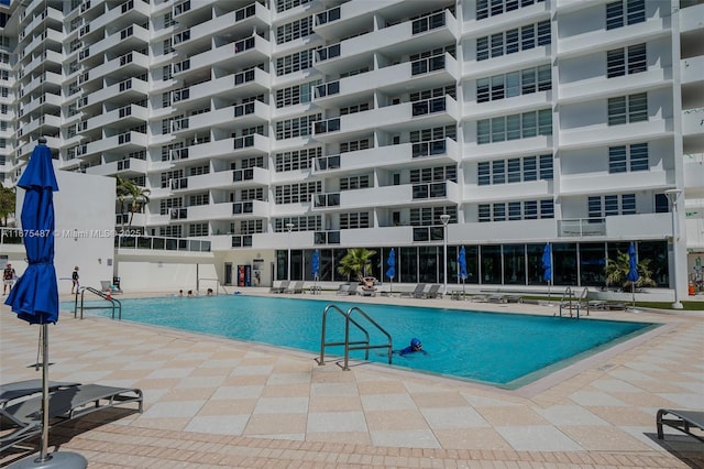 pool with a patio