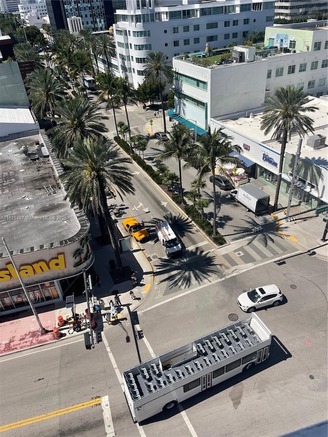 birds eye view of property with a view of city