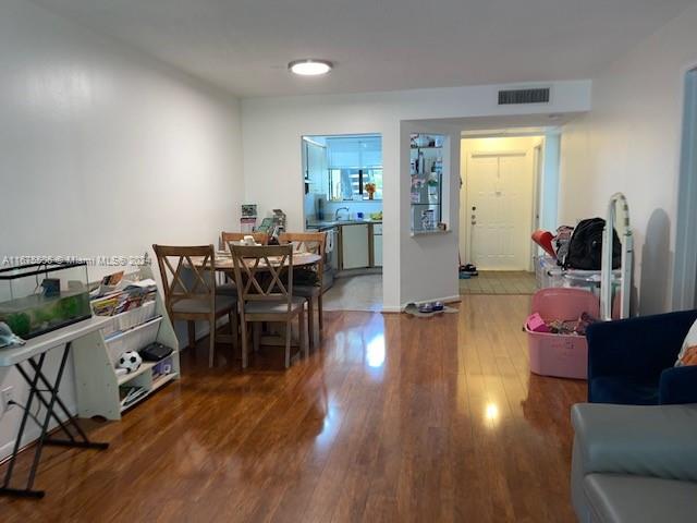 dining area featuring wood-type flooring