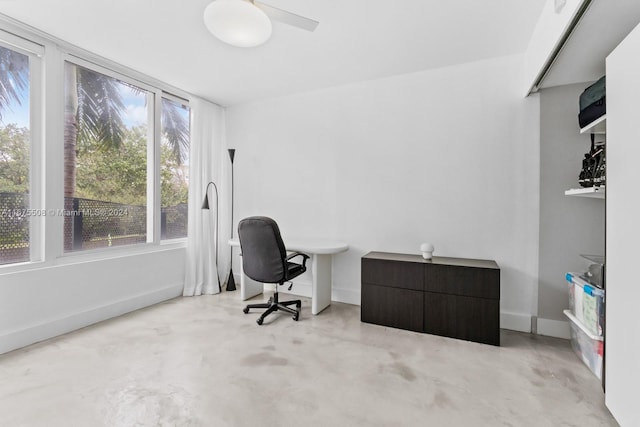 office area with ceiling fan