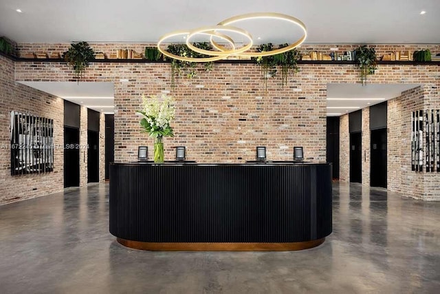 398 NE 5th St Unit 3610, Miami, FL 33132 - reception area with brick wall