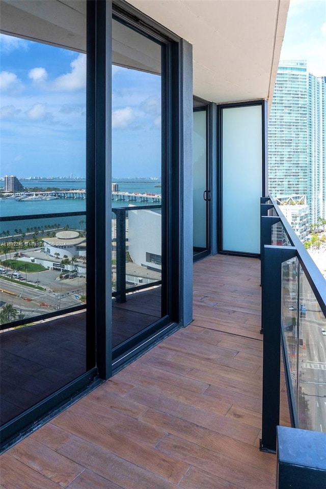 balcony featuring a water view