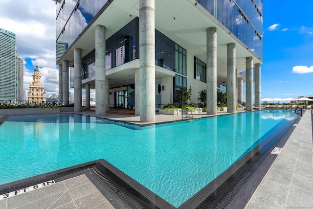 view of swimming pool with a patio