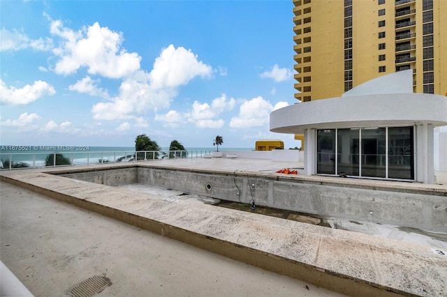 view of patio / terrace with a water view