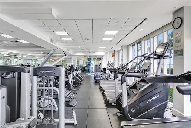 workout area with a drop ceiling