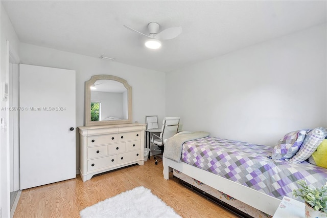 bedroom featuring ceiling fan and light hardwood / wood-style flooring