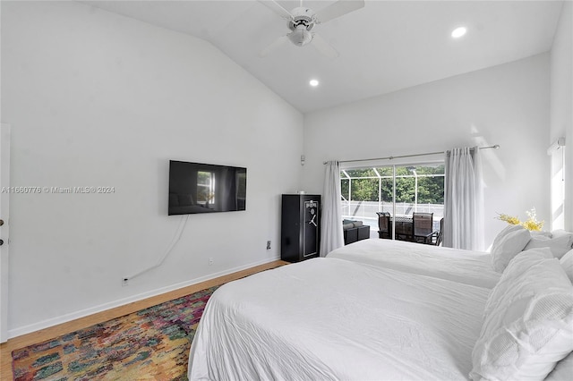 bedroom with wood-type flooring, lofted ceiling, and ceiling fan