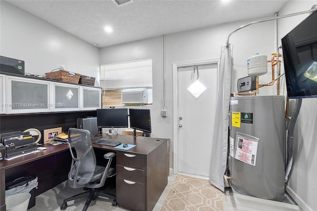 office space with cooling unit, water heater, and a textured ceiling