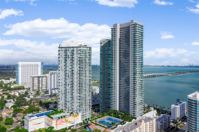 aerial view featuring a city view and a water view