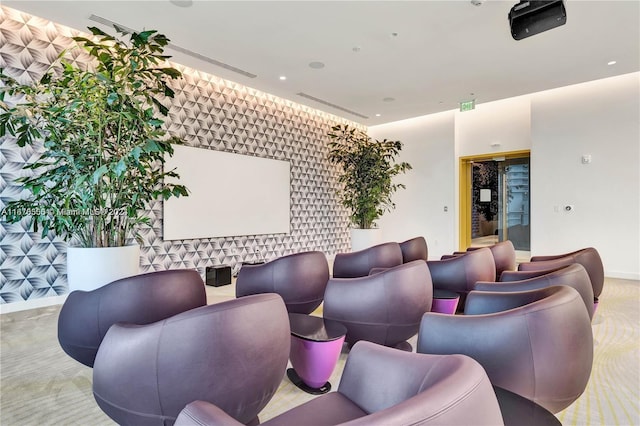 cinema room with baseboards and visible vents