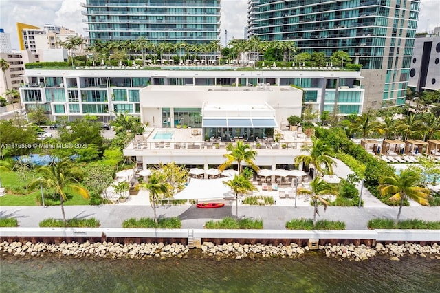 aerial view featuring a view of city and a water view