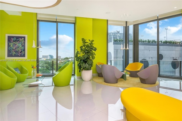 playroom with tile patterned flooring and floor to ceiling windows