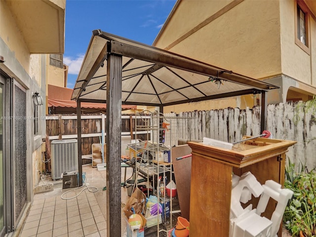 view of patio / terrace with a gazebo and central air condition unit