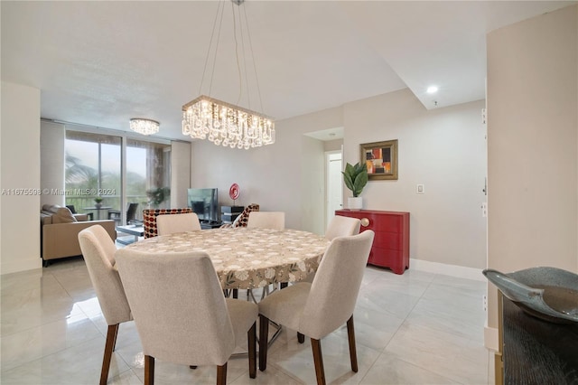 dining area featuring a chandelier