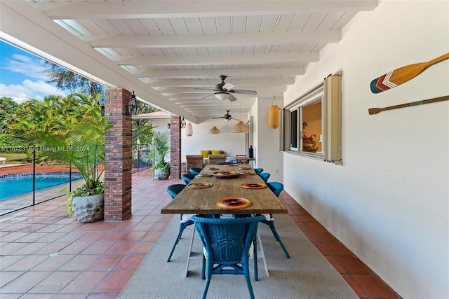 view of patio featuring ceiling fan