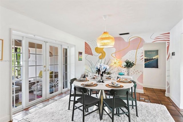 dining area featuring french doors