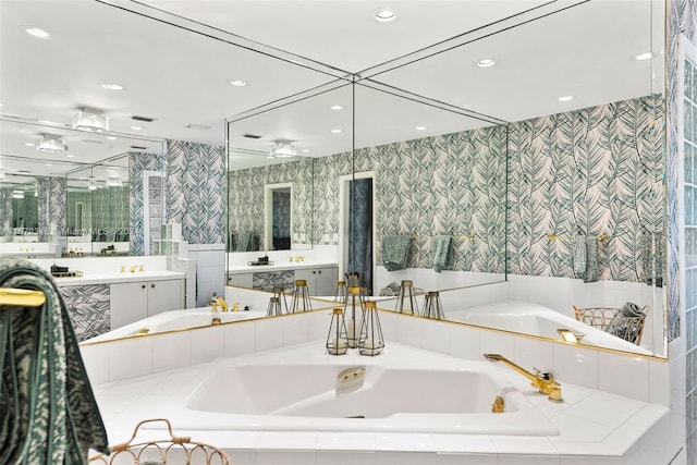 11420 SW 80th Rd, Pinecrest, FL 33156 - full bath featuring two vanities, a garden tub, recessed lighting, and wallpapered walls