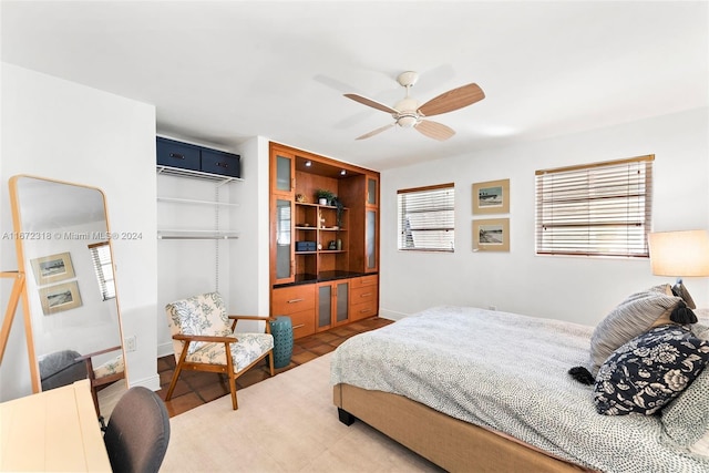 bedroom featuring ceiling fan