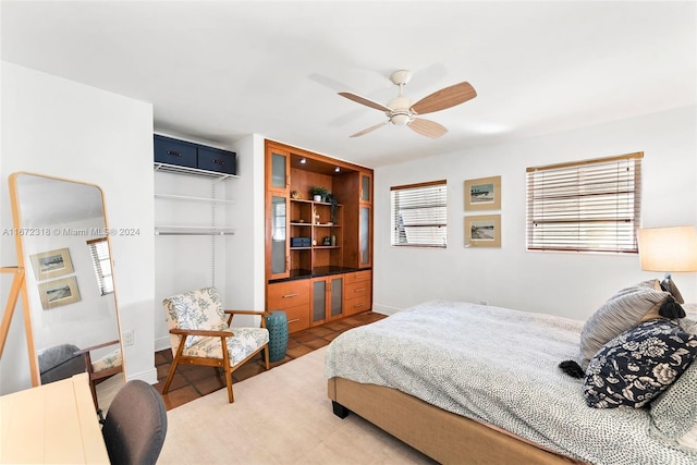 11420 SW 80th Rd, Pinecrest, FL 33156 - bedroom with ceiling fan, a wall unit AC, and baseboards