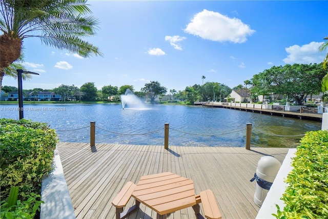 view of dock with a water view