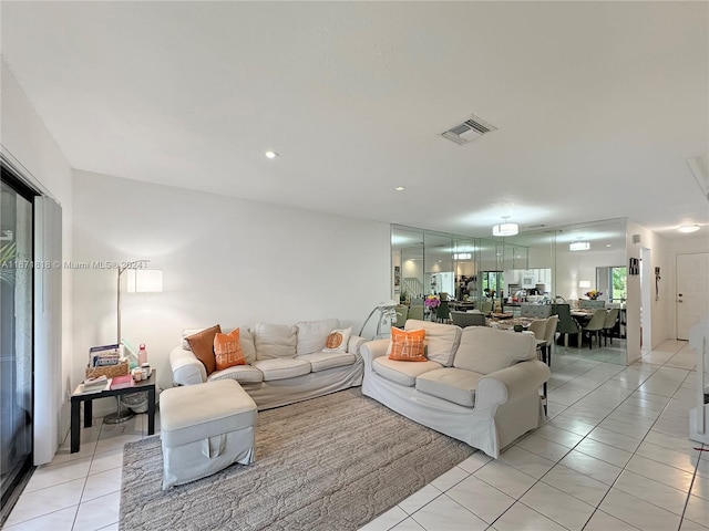 living room with light tile patterned floors