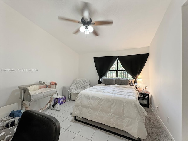 bedroom featuring ceiling fan and light tile patterned floors