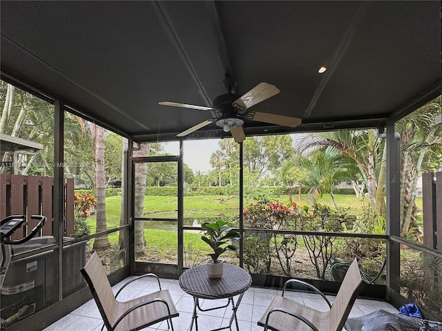 sunroom / solarium with ceiling fan and plenty of natural light