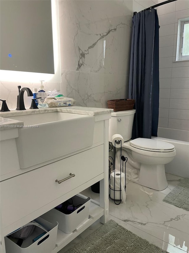 full bathroom with toilet, vanity, and shower / tub combo with curtain