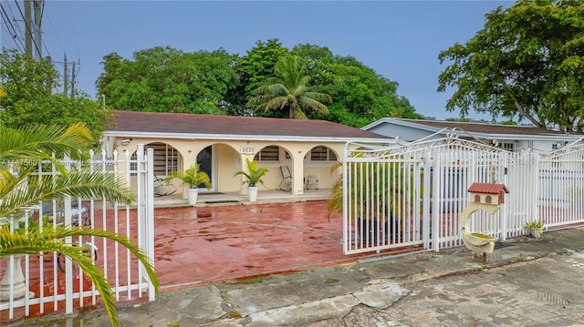 view of gate featuring a porch