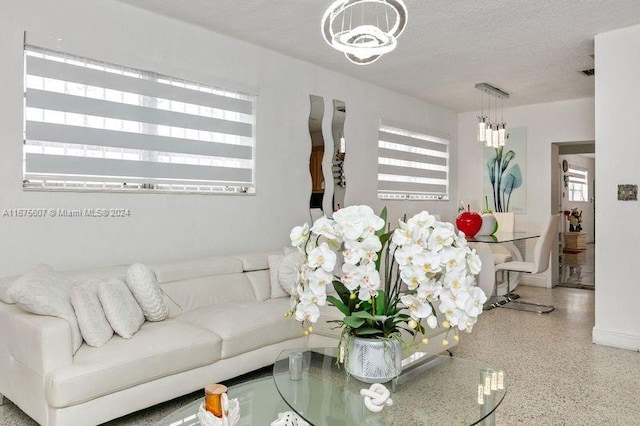 living room featuring a textured ceiling