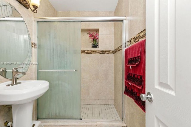 bathroom featuring an enclosed shower