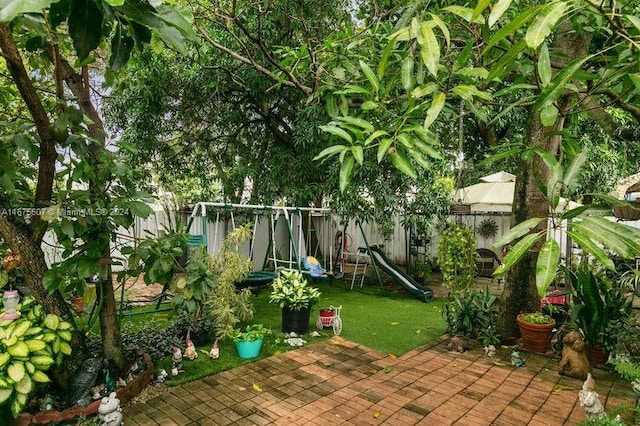 view of patio featuring a playground