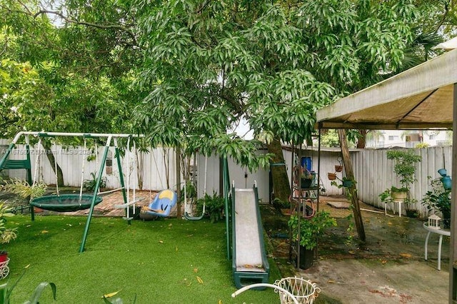 view of yard with a playground