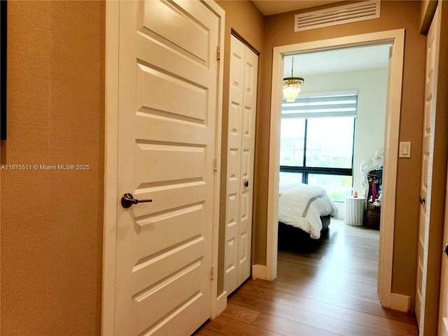 8363 NW 41 Unit A-406, Doral, FL 33166 - hallway featuring wood-type flooring