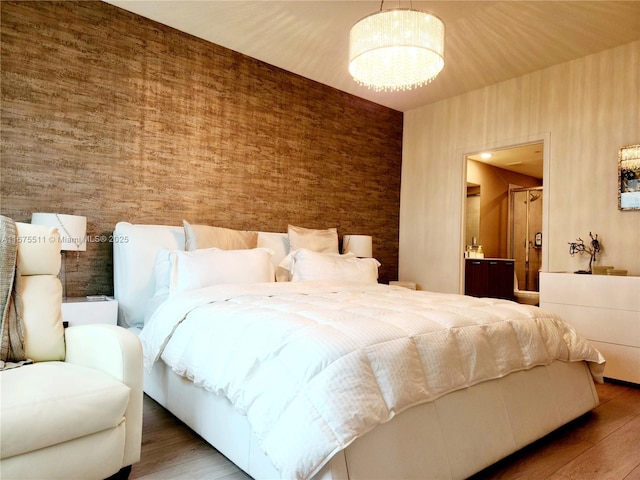 8363 NW 41 Unit A-406, Doral, FL 33166 - bedroom with wood finished floors and a chandelier