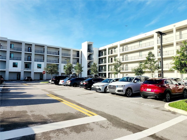 8363 NW 41 Unit A-406, Doral, FL 33166 - view of apartment building / complex featuring uncovered parking