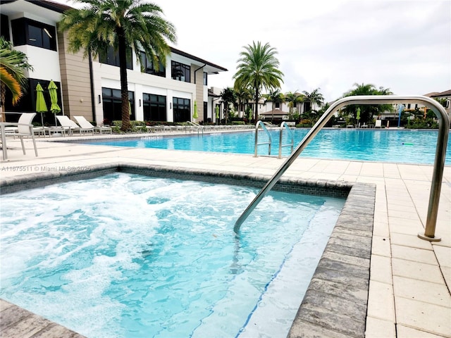 view of swimming pool featuring a patio