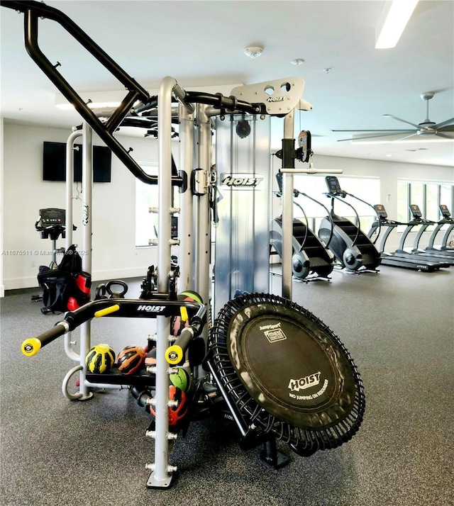 workout area with ceiling fan