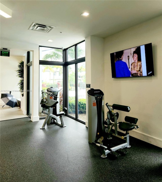 exercise room with a wall of windows