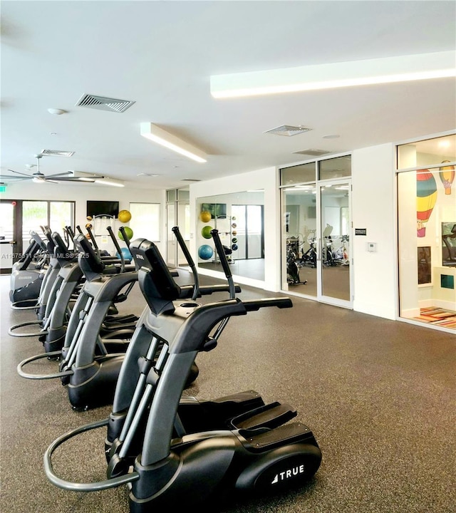 workout area with ceiling fan