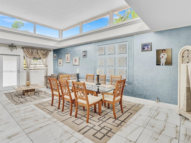 dining room featuring plenty of natural light