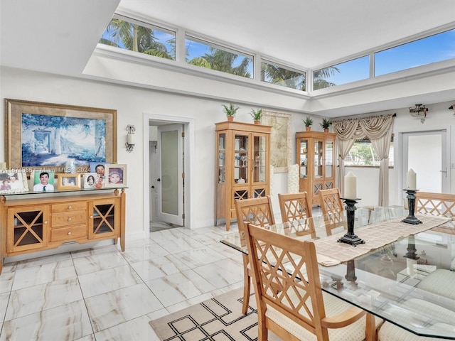 dining space with a skylight