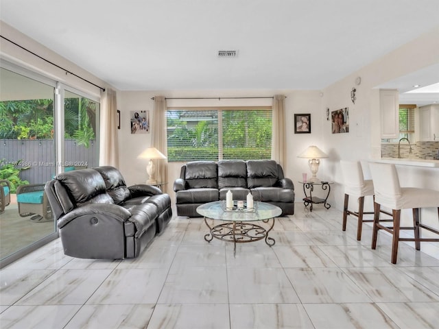 living room with a healthy amount of sunlight